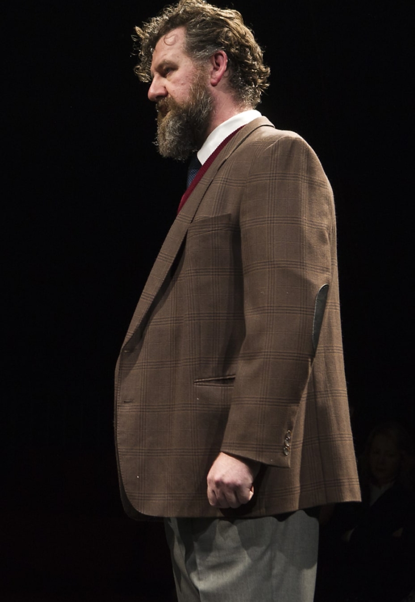 Two actors face one another.